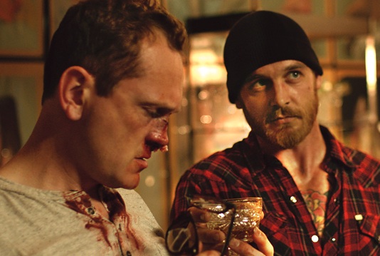 Pat Healy, left, and Ethan Embry in Cheap Thrills.