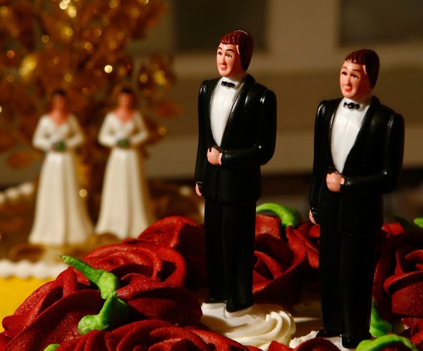 Same-sex wedding cake topper figurines. ((Photo via Getty Images)