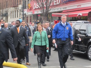 Mayor Bill de Blasio and emergency responders a block from the scene of the explosion.