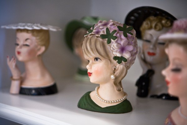 A collection of antique lady head vases. (Photo by Emily Anne Epstein)