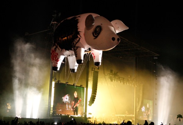 The Pig flies near the stage during a Roger Waters performance. (Photo via Getty Images)