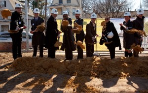 Jonathan Rose, fourth from left, breaking ground. 
