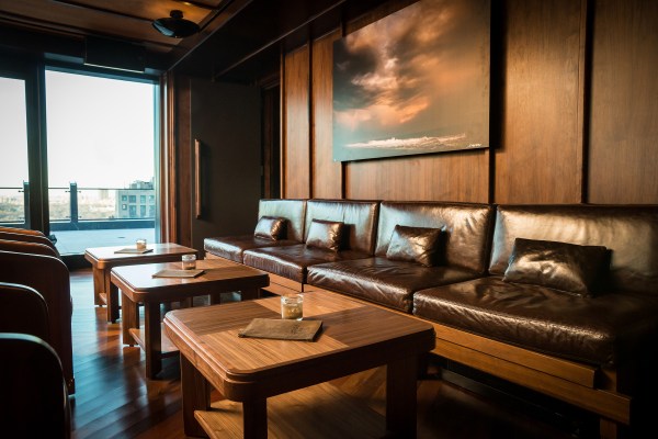 Leather couches and wood interiors lend a vaguely nautical air.