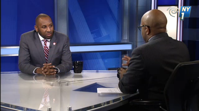 Donovan Richards speaking to NY1 host Errol Louis. (screengrab: NY1)