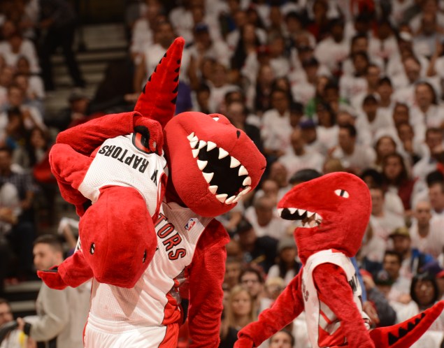 The Toronto Raptors mascots perform during Game One of the Eastern Conference Quarterfinals of the 2014 NBA playoffs against the Brooklyn Nets on April 10 (Photo by Ron Turenne/NBAE via Getty)