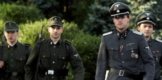 Jonas Armstrong, front, in Walking with the Enemy.