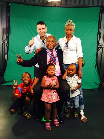 Mr. Shaked, Mr. Jantjie and his family behind the scenes at the commercial shoot. (Livelens) 