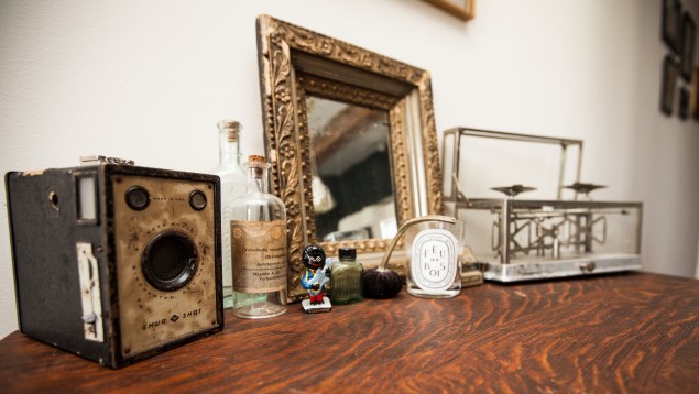 An assortment of knickknacks, velvet pumpkin in the center. (Photo by Emily Assiran)
