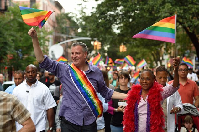 Mayor Bill de Blasio and First Lady Chirlane McCray march in the Brooklyn Pride Parade earlier this month. (Photo: Rob Bennett/Mayoral Photography Office)