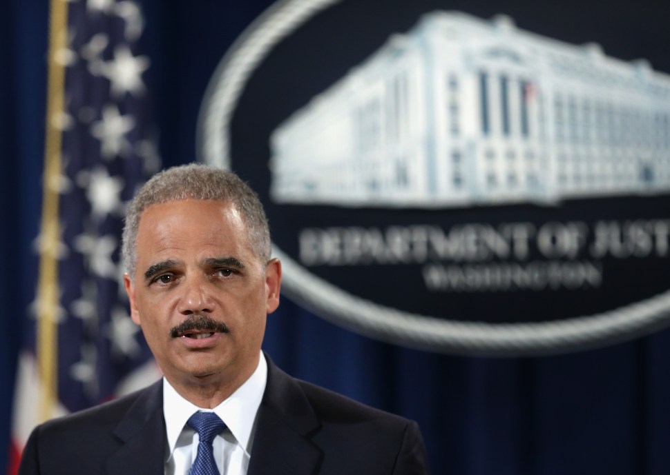 Attorney General Eric Holder has systematically consolidated the power and authority of the Department of Justice, opposing calls for reform. (Getty Images)