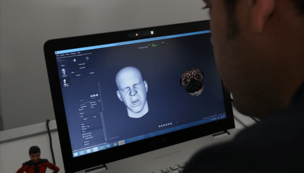 The camera mapped the demonstrator's expression live onto a 3D model of a pug. (Photo by Jack Smith IV)