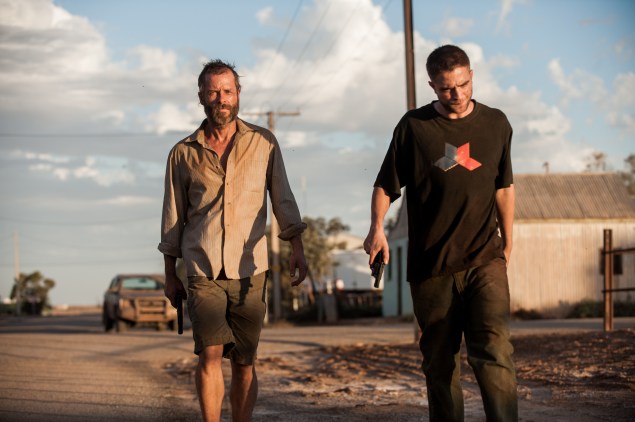 Guy Pearce and blank in The Rover.