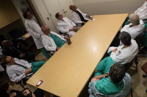 Doctors and nurses at Maimonides meet for a pre-surgical conference.