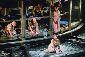 Soprano Melody Moore, lower right, in 'The Passenger.' (©Stephanie Berger)