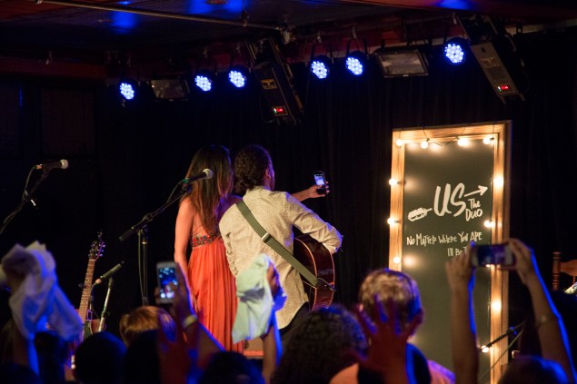 The duo films their New York Vine on stage. (Kaitlyn Flannagan)