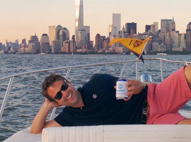 A Boatbound founder enjoyed himself on the bow during last week's press tour. (Photo via Boatbound)