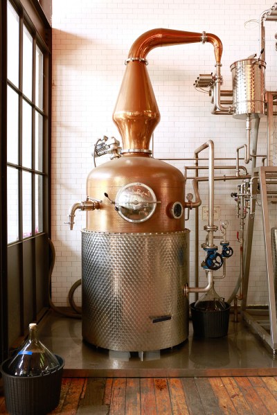 Oleson refers to the company's pot still as their "copper rocket ship."