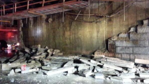 The collapsed Brooklyn Bridge facade (Courtesy of @FDNY Twitter)