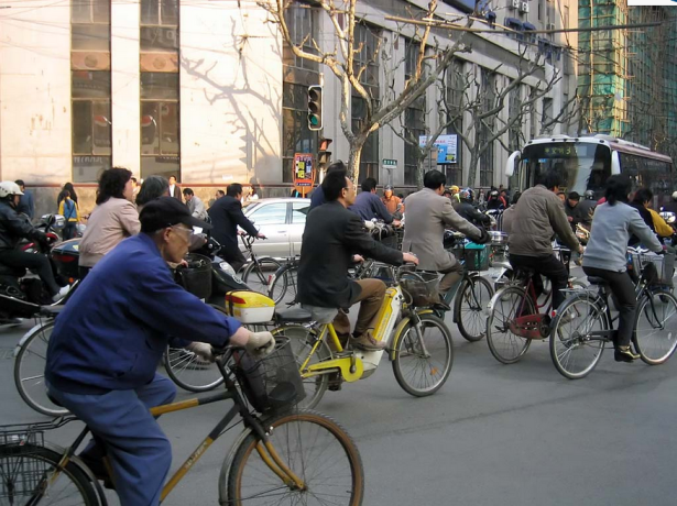 We bet all these Shanghai cyclists wish their bikes could do the biking for them. (Wikimedia Commons)