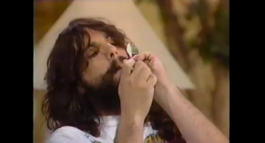 Rev. Bud Green lighting up on an episode of the Joan Rivers Show. (YouTube)