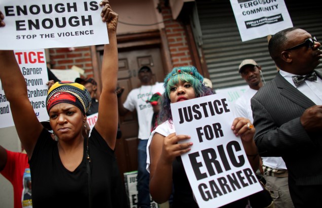  People attend a rally against police violence on August 23 in Staten Island (Photo by Yana Paskova/Getty Images).