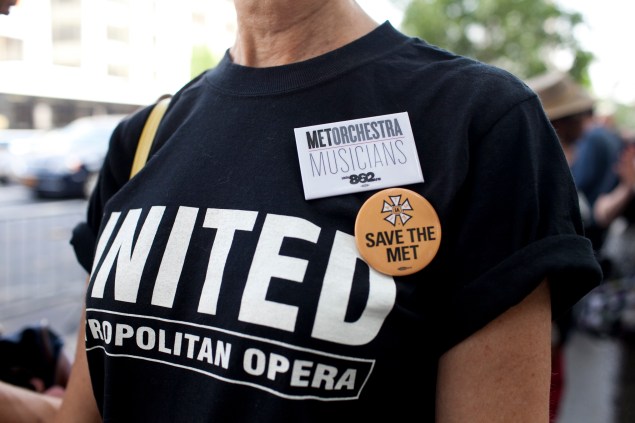 Members of The Met Orchestra' Union Local 802, AFM rally across the street from Lincoln Center to remove the the threat of a lockout and extend negotiations until an agreement is reached with Opera managers. Photo by Aaron Adler/For New york observer