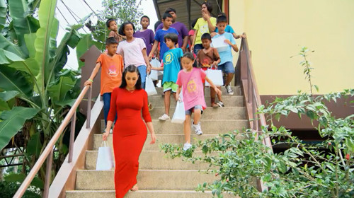Kim, Peenk and the other orphans. (Photo via E! Online)