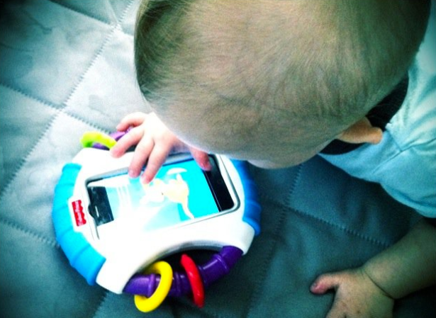 Children born in the past few years will be the first generation with lifelong exposure to cell phone radiation. (Photo via Mobilize)