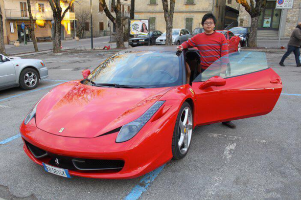 Kreyos cofounder Steve Tan with a new Ferrari. The photo was allegedly pulled off of his personal Facebook account before he kicked up his privacy settings and scrubbed clean all affiliations with Kreyos. (Photo via Facebook)