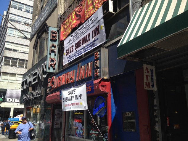 Subway Inn still displays its original neon sign, shining since 1937 on the corner of 60th and Lexington. (Photo by Emma Hernandez)