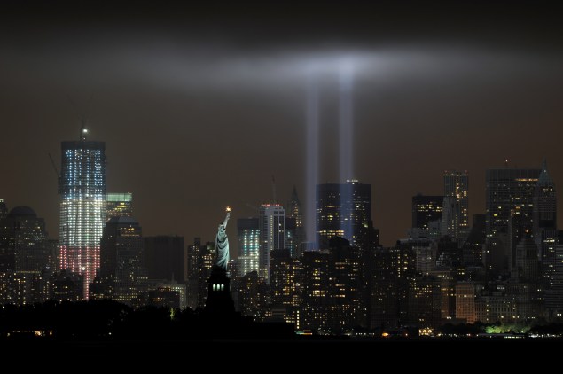 The annual "Tribute in Light "memorial echoing the twin towers of the  World Trade Center illuminates the night sky. (Photo by STAN HONDA/AFP/Getty Images)