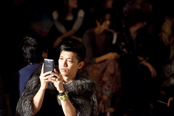 Bryanboy snaps a photo at the Costello Tagliapietra show in 2012. (Photo via Getty)