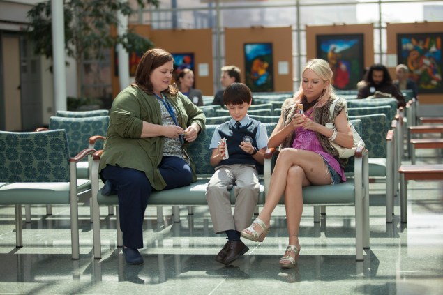 In St. Vincent, Melissa McCarthy, left, fits into her first “straight” role, and it’s nice to see her without her usual vulgarity.