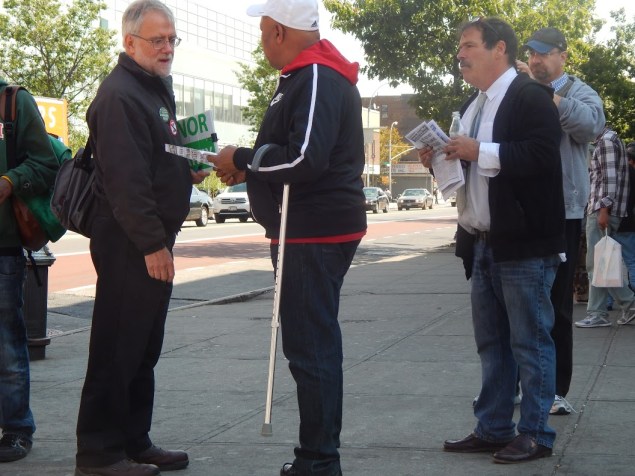 Howie Hawkins and Randy Credico talk to voters at 125th Street and Lexington Avenue (Photo: Will Bredderman).