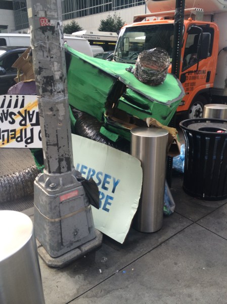 The corner of Sixth Avenue and 43rd street was left strewn with litter following Sunday's People's Climate March