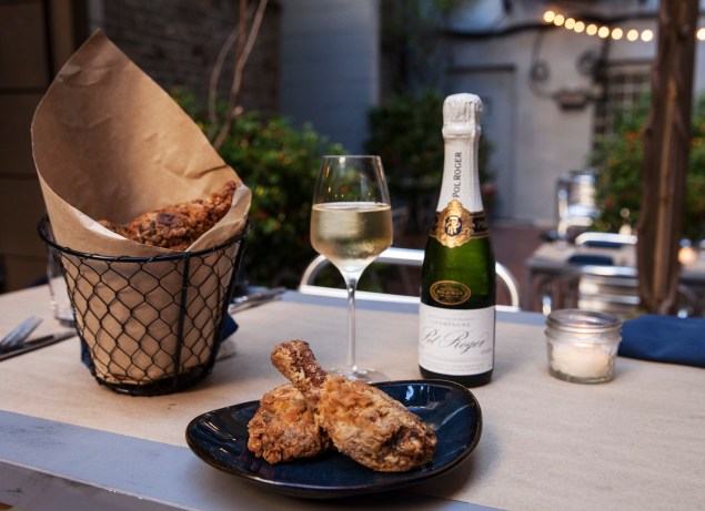 For $55, customers can order a “Splitty-Split,” the restaurant’s term for a half-chicken and a split of champagne. (Photos by Lea Rubin for the New York Observer)