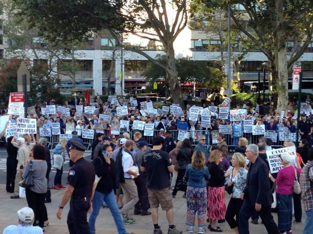 Protestors demonstrate as people arrive for the opening night of the Metropolitan (Photo by James Jorden)