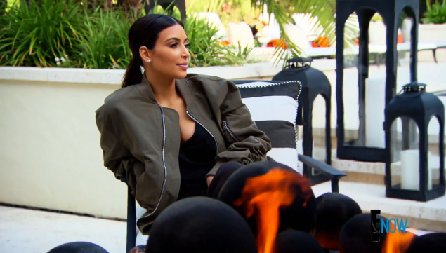 Kim's icy glare is no match for Bruce's industrial strength man-pony. But note the gas-fueled firepit symbolizing her inner hatred for her less chic family members. (Photo via E! Online)