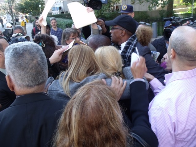 Former Assemblywoman Gabriela Rose, center right, is shielded by supporters as the media surrounds her outside court. (Photo: Jillian Jorgensen)