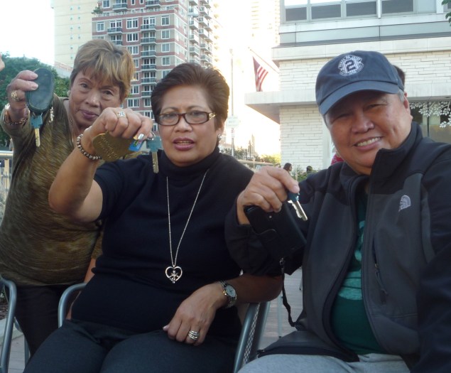 St. Joseph's tenants, from left: Nelida Valmona, Terry De La Paz, and Rose Jean Bulong. (Photo by Heather Dubin)