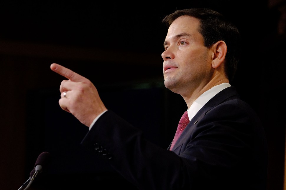 WASHINGTON, DC - DECEMBER 17:  Sen. Marco Rubio (R-FL) reacts to U.S. President Barack Obama's announcement about revising policies on U.S.-Cuba relations on December 17, 2014 in Washington, DC. Rubio called the President a bad negotiator and criticized what he claimed was a deal with no democratic advances for Cuba.  (Photo by T.J. Kirkpatrick/Getty Images)