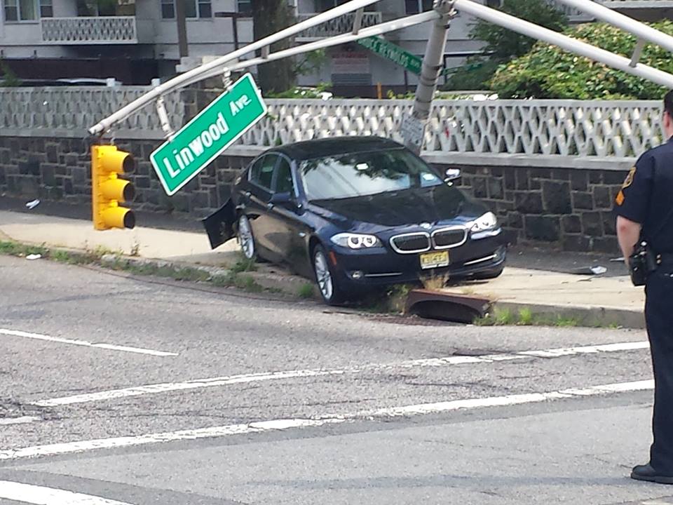 Mark J. Semeraro's 5-series Bimmer was smashed by a driver who blew a red light, yards from the entrance to the George Washington Bridge. 