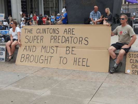 Demonstrators at that protest highlight Clinton's 1996 comments casting young black juvenile offenders as "super predators"