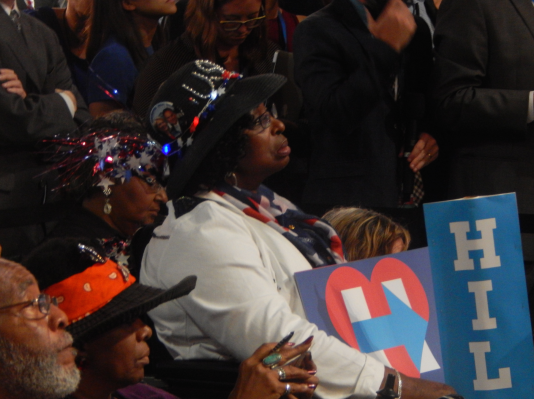 One delegate watches as Chelsea Clinton speaks before introducing her mother