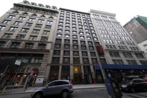 30 west 18th Mysterious! Futterman Fills New Chelsea Retail