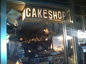 cake Upstart Four Winds Snags LES Buildings Housing Troubled Cake Shop Rock Club