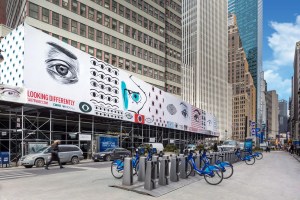 Lightstone Group's eye-popping scaffolding bridge around 1407 Broadway. (Credit: Evan Joseph)