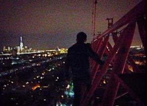 Teen Sneaks to Top of 1 World Trade Center (Credit: NY Daily News via Twitter)