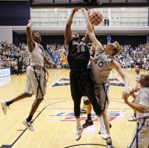 Providence forward Kadeem Batts (10) dunks on Xavier's Matt Stainbrook (40). (Credit: Frank Victores, USA TODAY) 