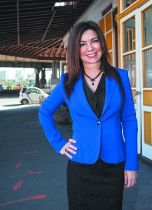 Adelaide Polsinelli in front of her listing at 116-119 South Street. (Lea Rubin Photography)